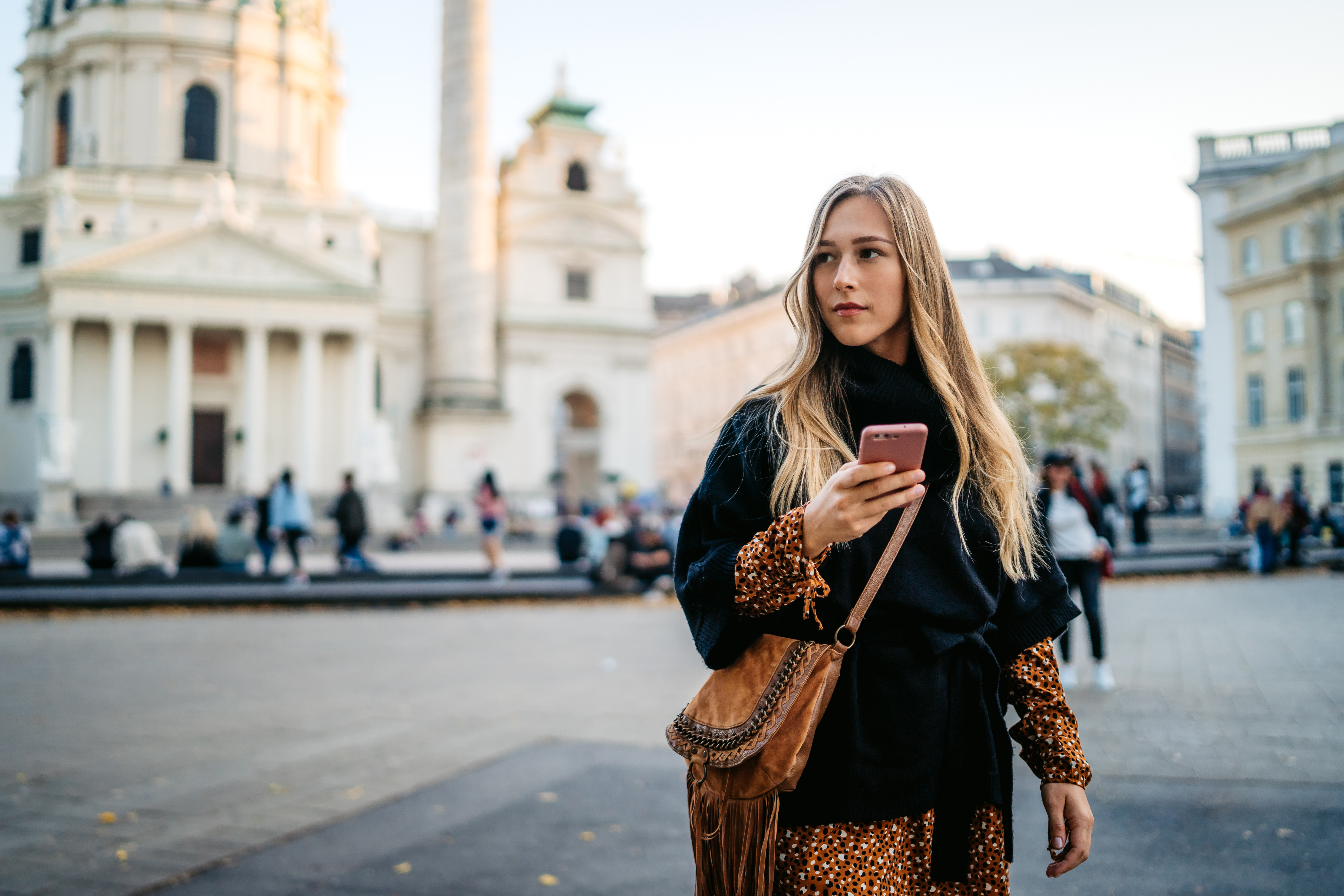 person traveling holding phone