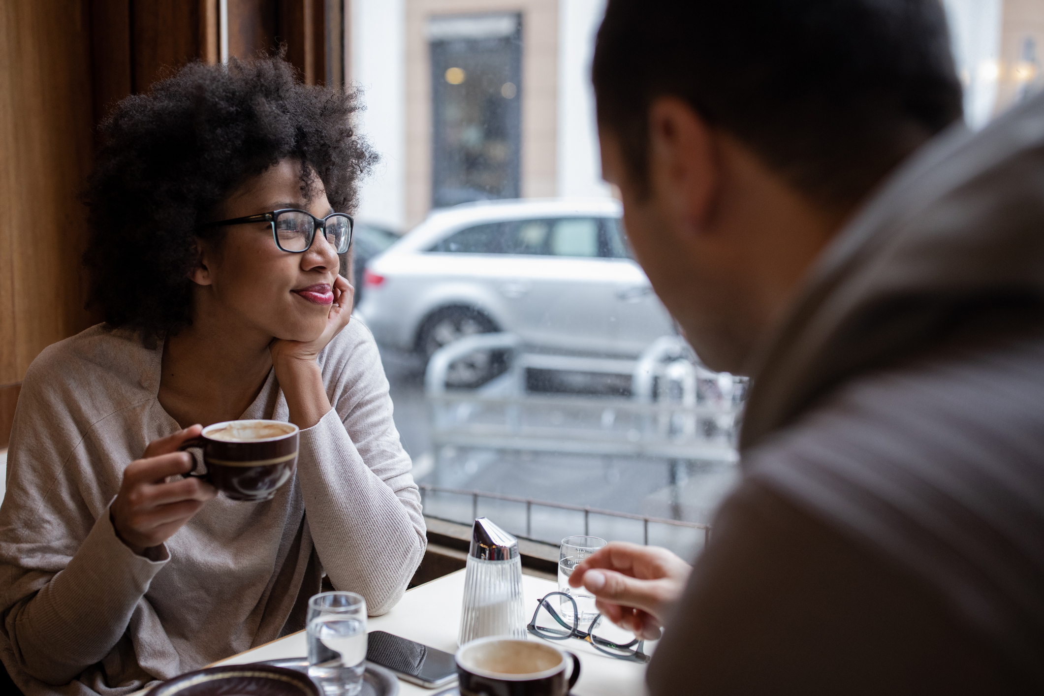 two people in cafe