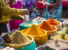 colorful pyramids of spices at market