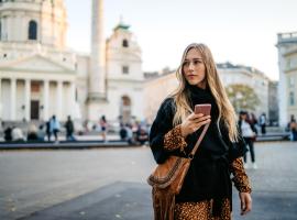 person traveling holding phone